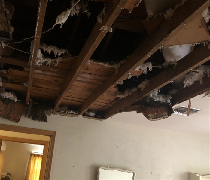 damaged ceiling of water damaged property
